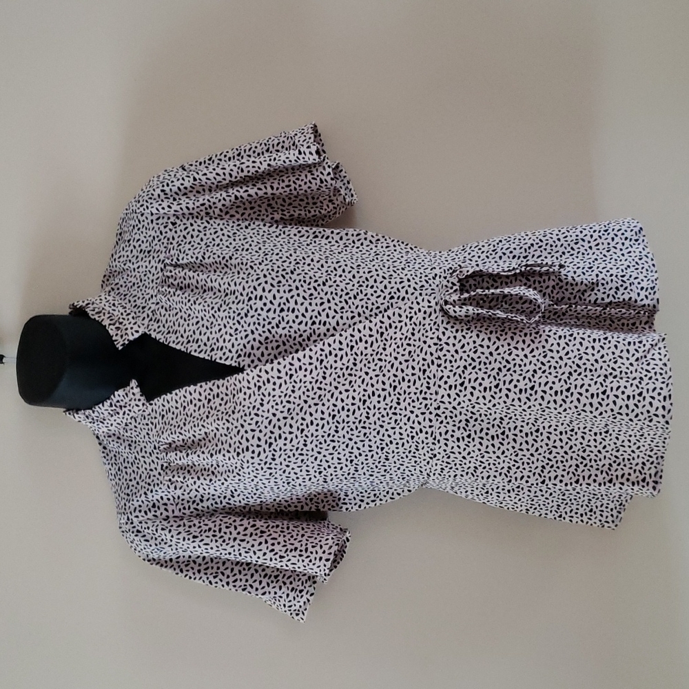Monteau peplum top